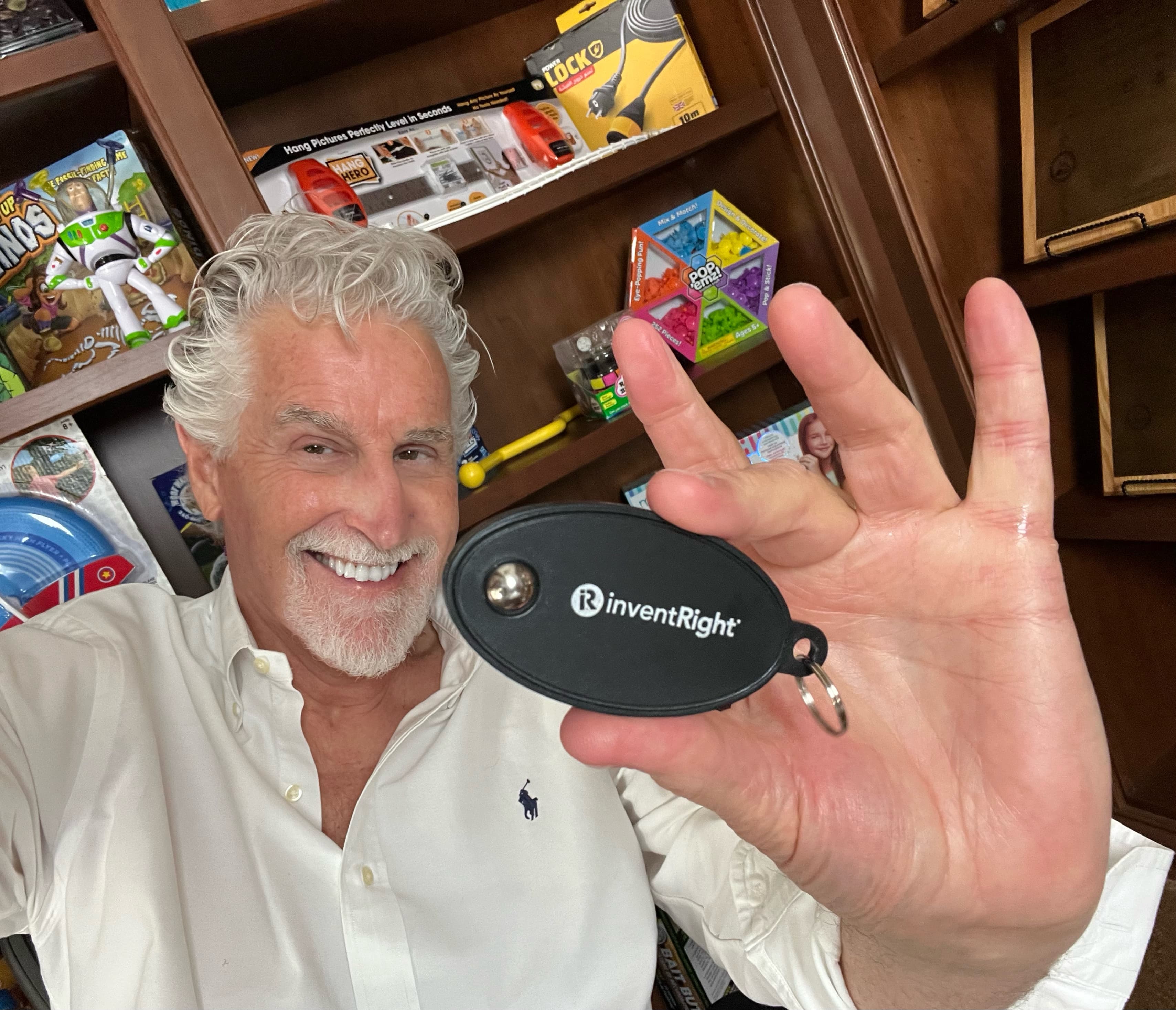 Stephen Key holding one of Veronica Rodriguez’s licensed products